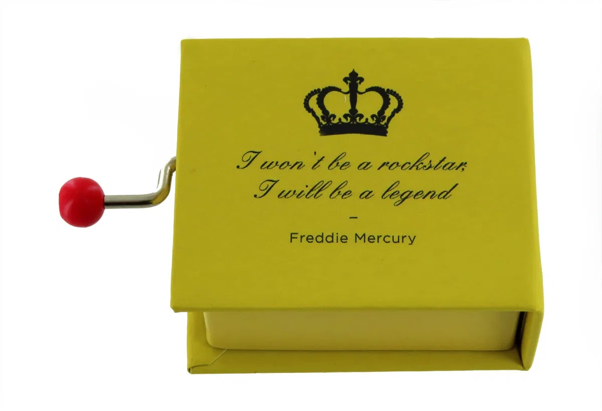 Caja de música/caja musical de manivela de cartón decorado en forma de libro con mecanismo musical de 18 notas - We are the champions (Queen - F. Mercury)
