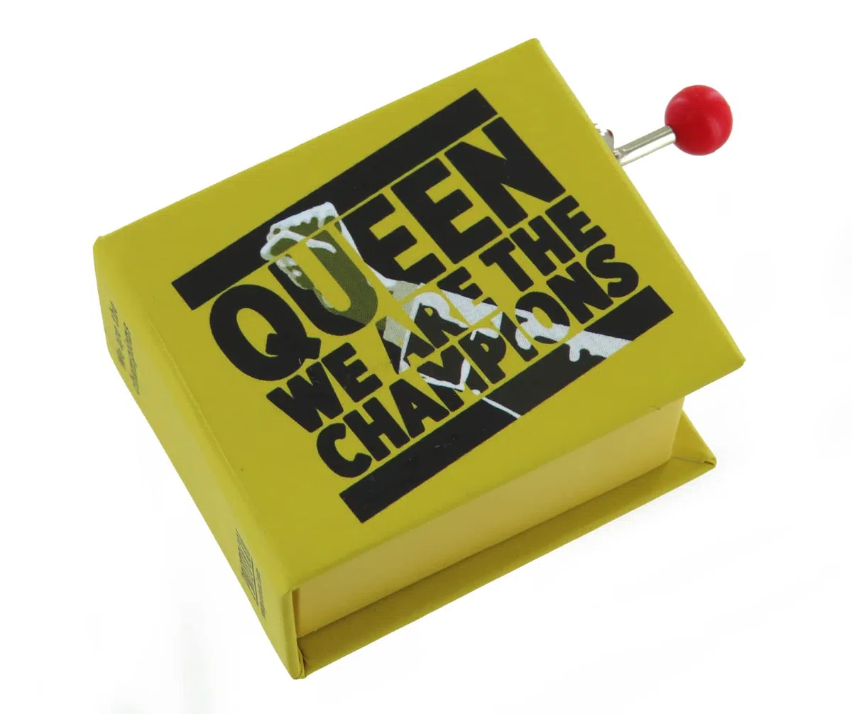 Caja de música/caja musical de manivela de cartón decorado en forma de libro con mecanismo musical de 18 notas - We are the champions (Queen - F. Mercury)