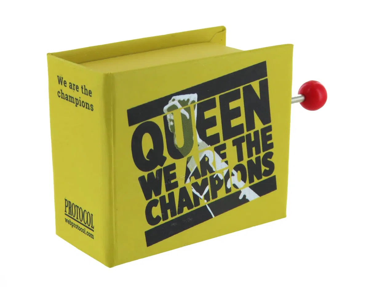 Caja de música/caja musical de manivela de cartón decorado en forma de libro con mecanismo musical de 18 notas - We are the champions (Queen - F. Mercury)